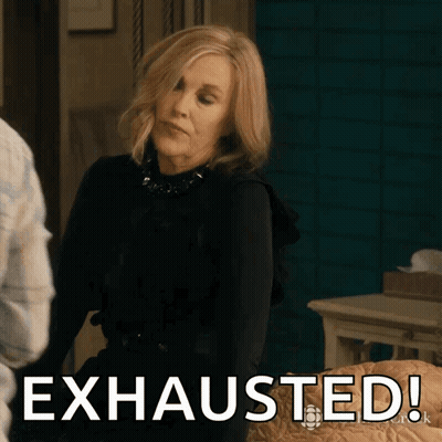 Woman In Black Dress Says Exhausted GIF