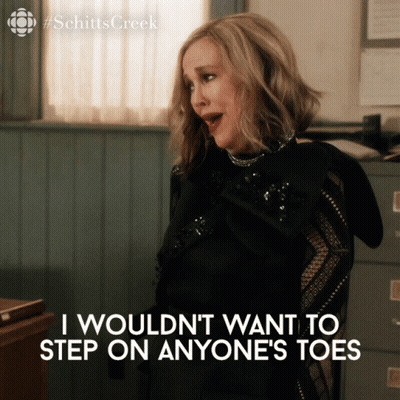 Woman In Black Dress Says I Wouldn't Want To Step On Anyone's Toes GIF