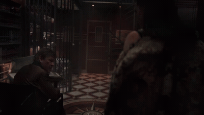 Woman In Black Dress Standing GIF