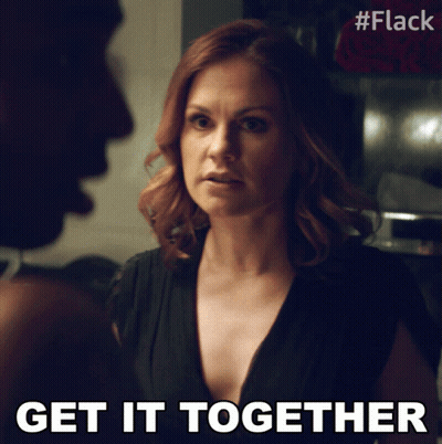 Woman In Black Dress Talking To Man Saying Get It Together GIF