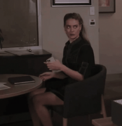 Woman In Black Dress Using Keyboard GIF