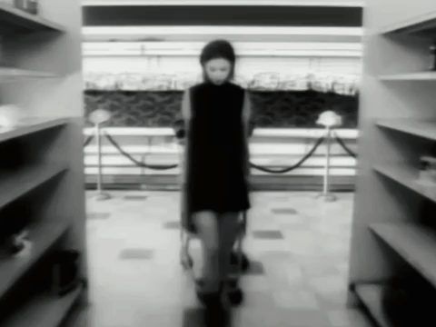Woman In Black Dress Walking GIF