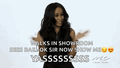 Woman In Black Dress Walking In Showroom GIF