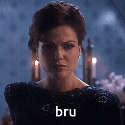 Woman In Black Dress With Bru On Face GIF