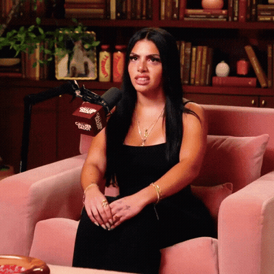 Woman In Black Dress With Caller ID Microphone GIF
