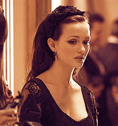 Woman In Black Dress With Flower Headband GIF