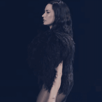 Woman in Black Fur Coat and Bodysuit