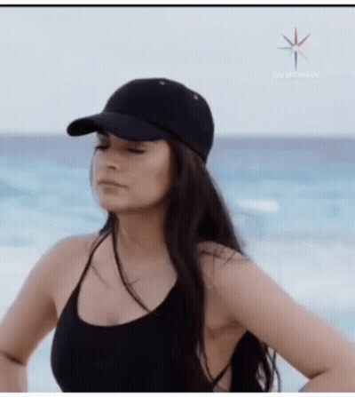 Woman In Black Hat And Black Swimsuit GIF
