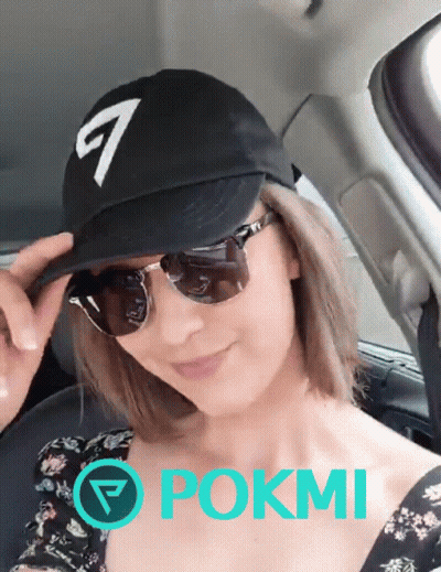 Woman In Black Hat And Sunglasses In Car With Pokmi GIF