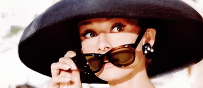 Woman In Black Hat And Sunglasses Looking Left GIF