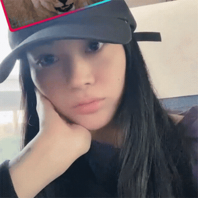 Woman In Black Hat Covering Face GIF