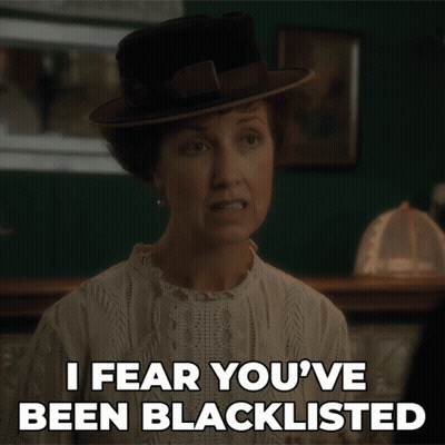 Woman In Black Hat Says I Fear You've Been Blacklisted GIF