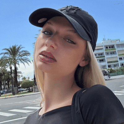 Woman In Black Hat With Letter Y GIF