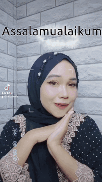 Woman In Black Hijab Saying Assalamualaikum GIF