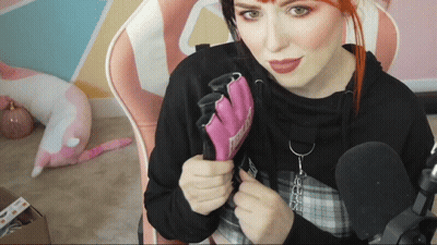 Woman In Black Hoodie Holding Nintendo Glove GIF