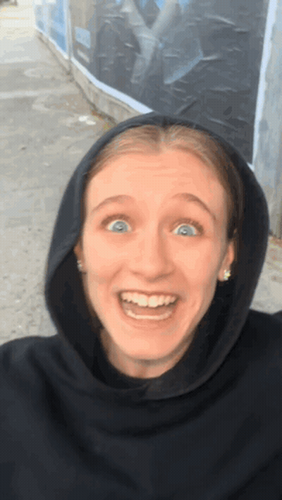 Woman In Black Hoodie Making Face GIF