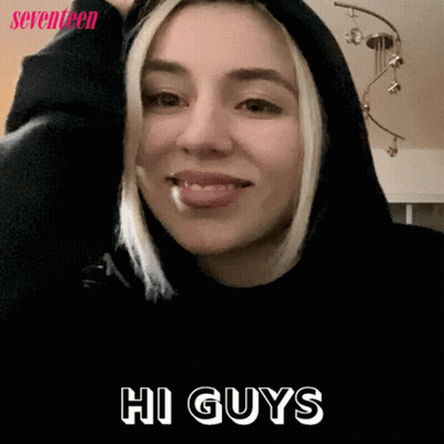 Woman In Black Hoodie Saying Hi Guys GIF