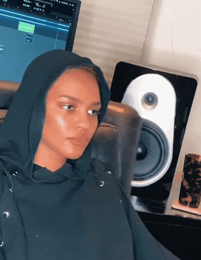 Woman In Black Hoodie Sitting At Computer GIF