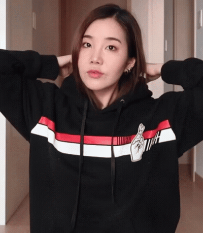 Woman In Black Hoodie With Red White Blue Stripe GIF