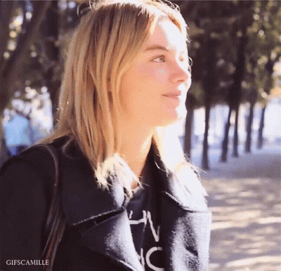 Woman In Black Jacket And Shirt With NC GIF
