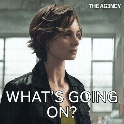 Woman In Black Jacket Asking What's Going On GIF