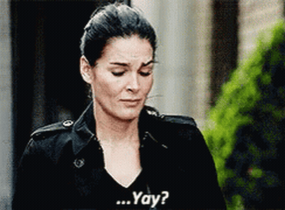 Woman In Black Jacket Asking Yay GIF