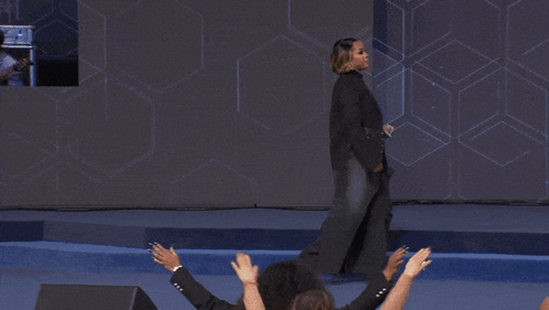 Woman In Black Jacket Holding Microphone GIF