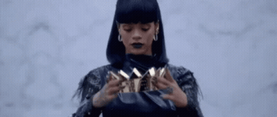 Woman In Black Jacket Holding Purse GIF