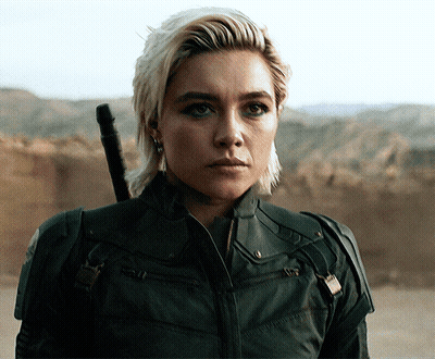 Woman In Black Jacket Holding Sword GIF