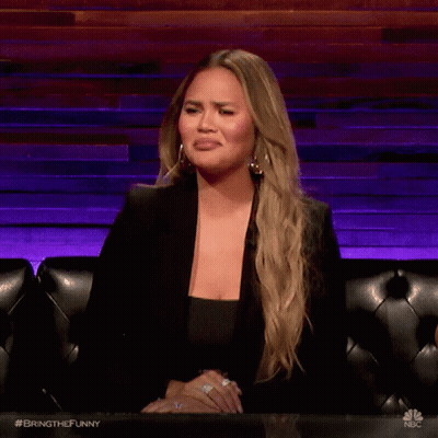 Woman In Black Jacket Making Funny Face GIF