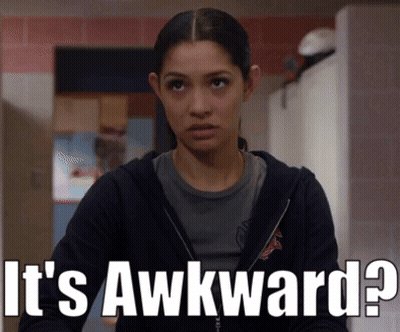 Woman In Black Jacket Saying Awkward GIF