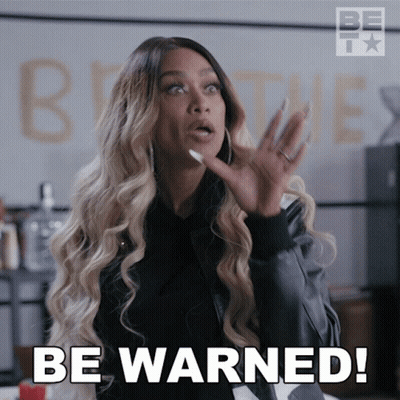 Woman In Black Jacket Saying Be Warned Hands In Air GIF