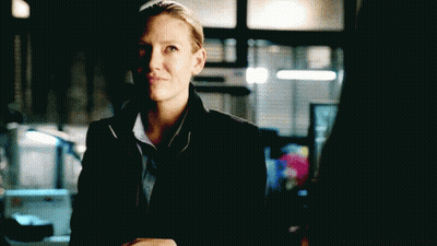 Woman In Black Jacket Smiling At Camera GIF