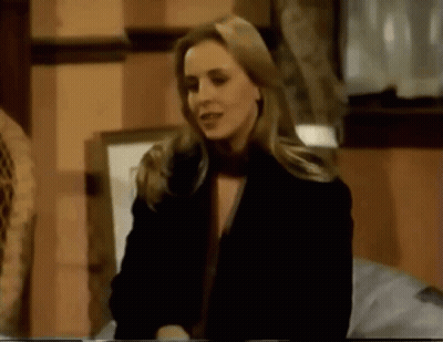 Woman In Black Jacket Standing GIF