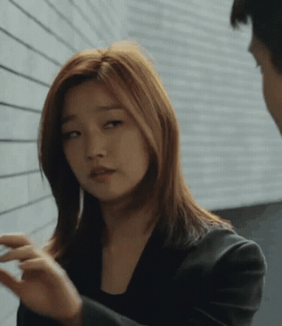 Woman In Black Jacket Talking To Woman GIF