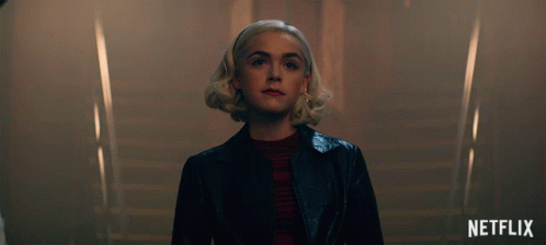 Woman In Black Jacket With Staircase And Netflix GIF