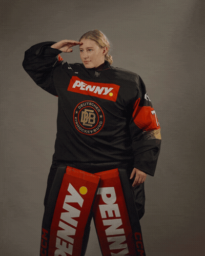 Woman In Black Jersey With Penny On Front GIF