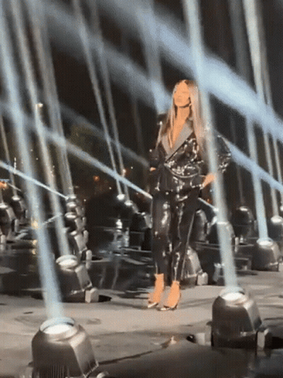 Woman In Black Jumpsuit GIF