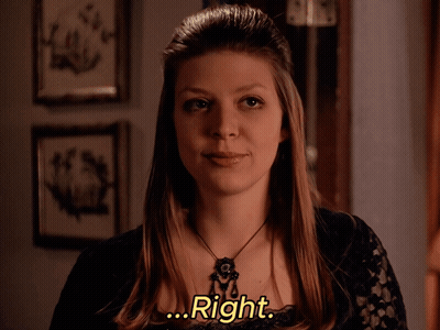 Woman In Black Lace Top Saying Right GIF