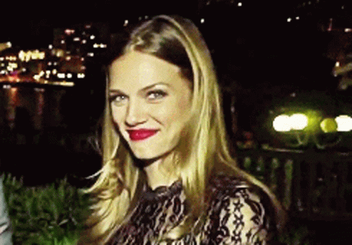 Woman In Black Lace Top Smiling GIF