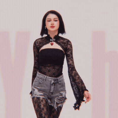 Woman In Black Lace Top With Heart Necklace GIF