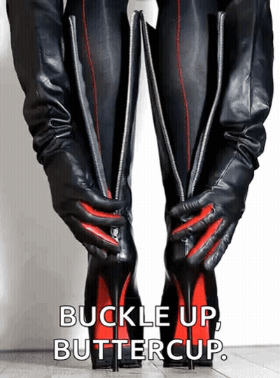 Woman In Black Leather Boots With Red Stitching GIF