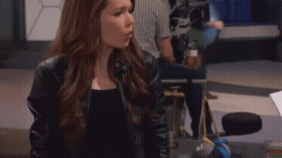 Woman In Black Leather Jacket At Computer GIF