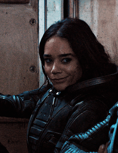 Woman In Black Leather Jacket Close Up GIF