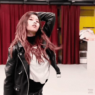 Woman In Black Leather Jacket Dancing Red Curtain GIF
