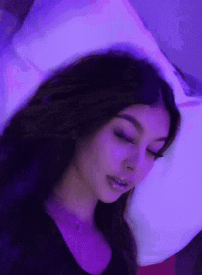 Woman In Black Leather Jacket Making Funny Face GIF