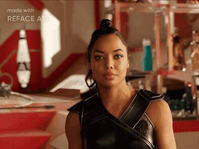 Woman In Black Leather Outfit GIF