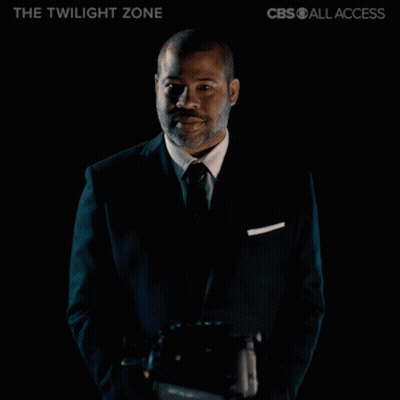Woman In Black Mask With A Necklace GIF