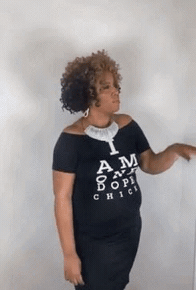 Woman In Black Off-Shoulder T-Shirt Pointing GIF
