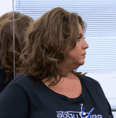 Woman In Black Shirt About Us GIF